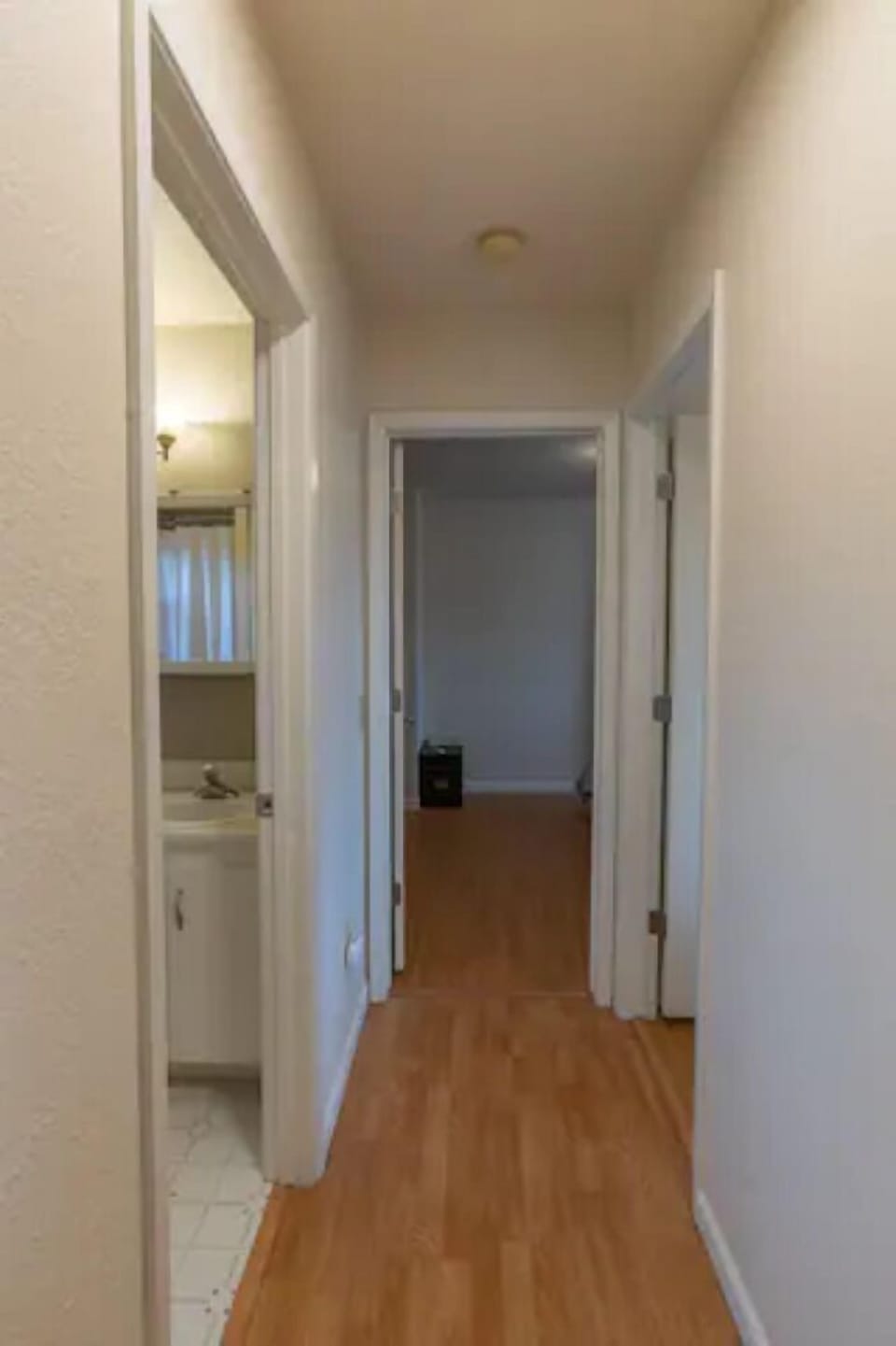 Hallway to upstairs bedrooms and bathroom.