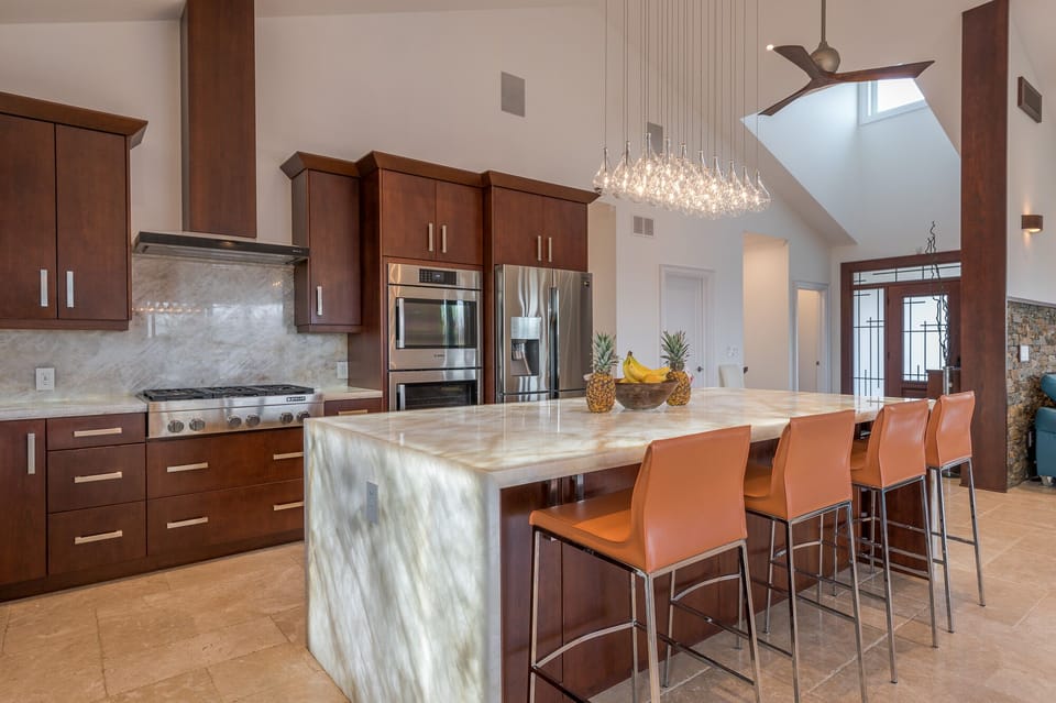Main kitchen and dining area with translucent custom built marble counter top