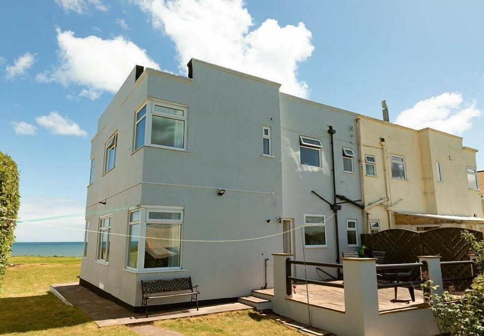 Front of the property, on the edge of the beach front