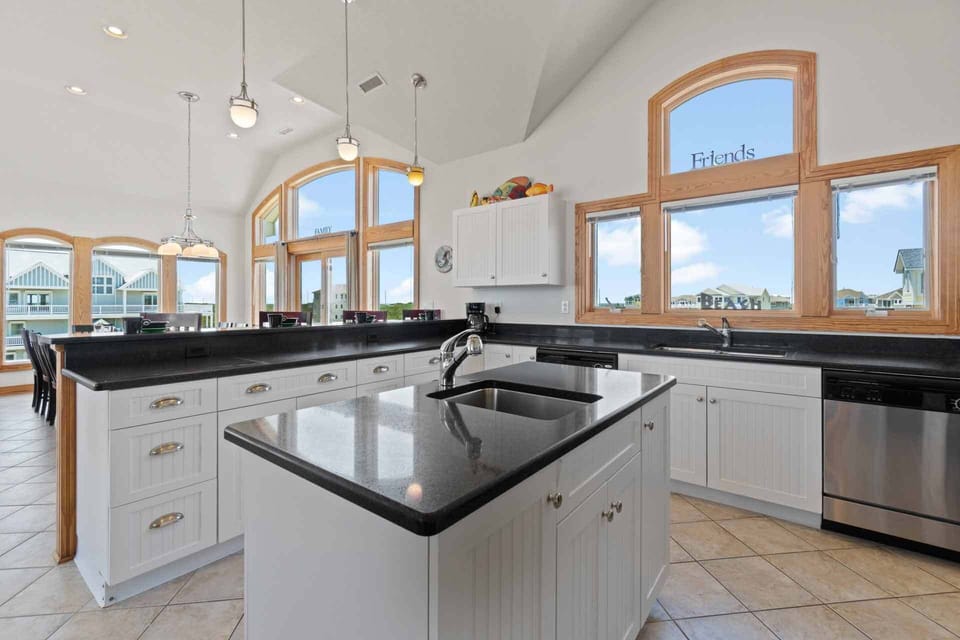 Breakfast bar with soaring ceilings.