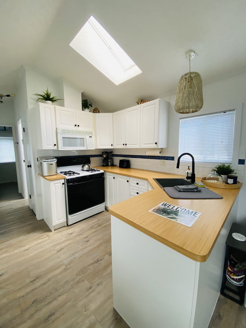 Propane stove/oven in kitchen.