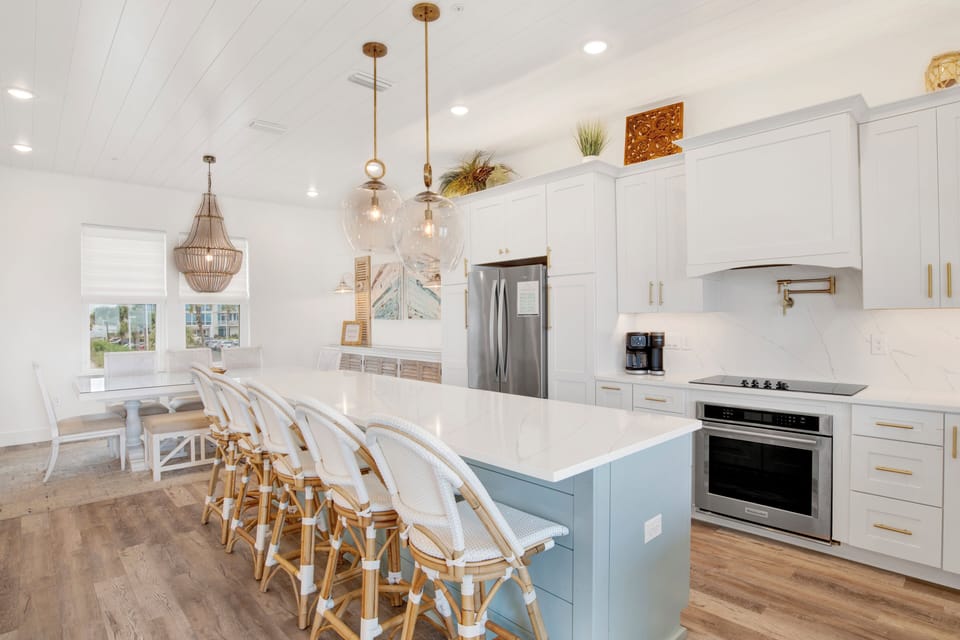 Stunning kitchen with stone counters and stainless appliances