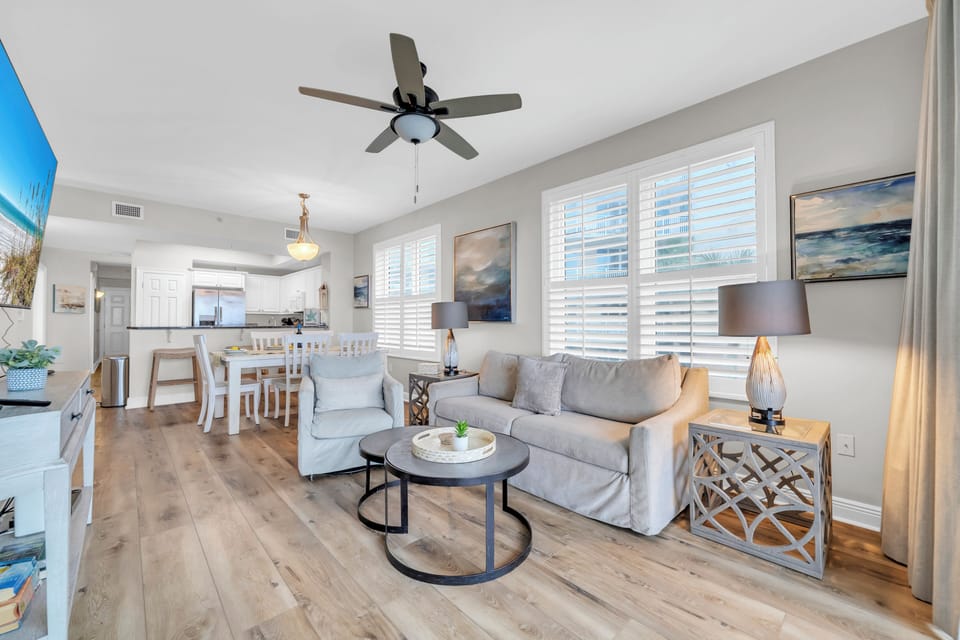 Settle into your bright, modern living space with coastal charm. Relax on plush seating while ocean breezes flow through.