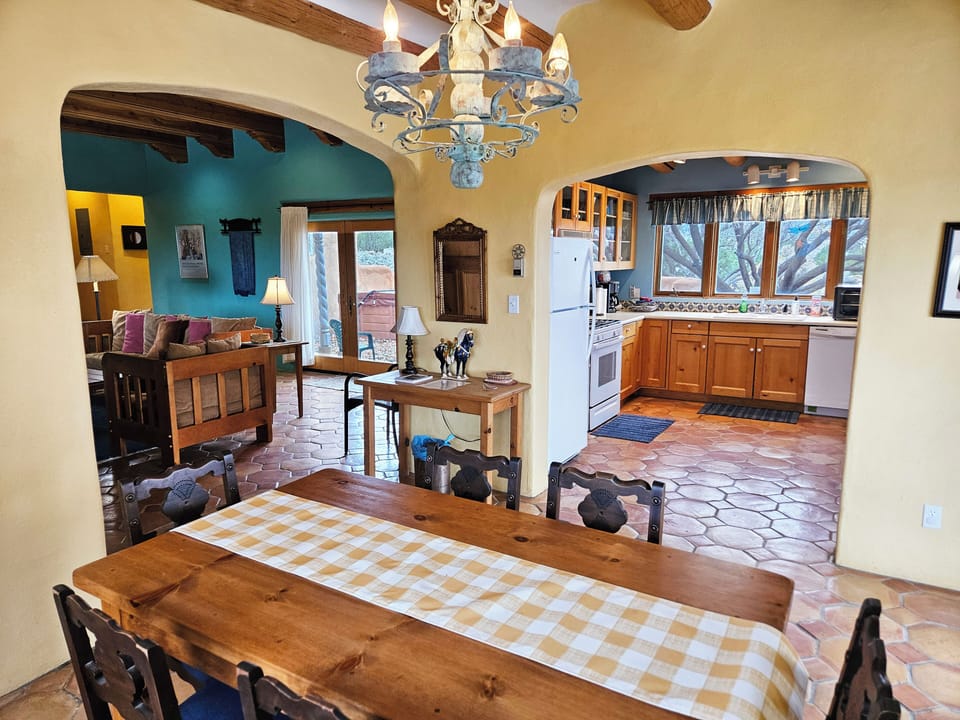 Dining area with view to kitchen and living room.