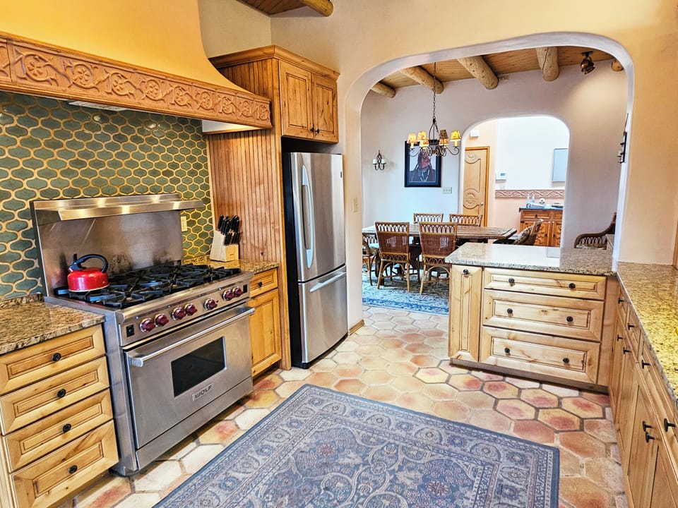 Fully Equipped Kitchen with Wolf oven-range + stainless fridge