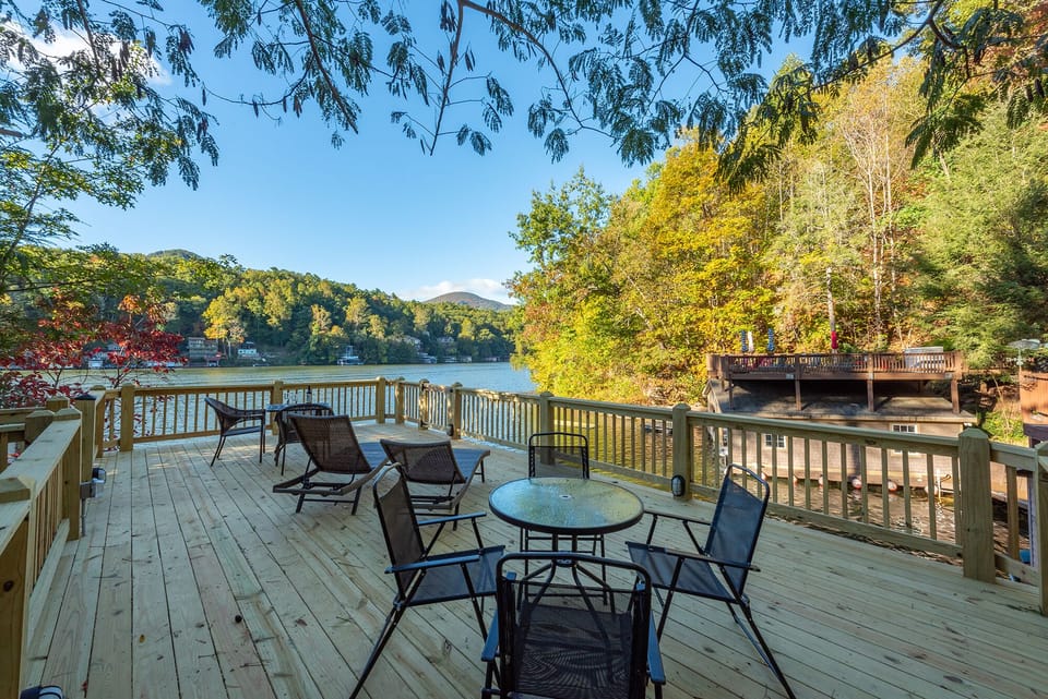Relax on the spacious deck with ample seating as you take in the stunning panoramic views of Lake Lure.