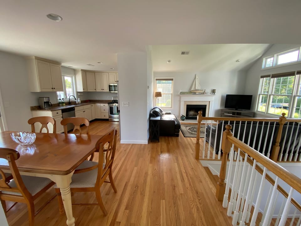 Hall looking at living/ kitchen/dining 