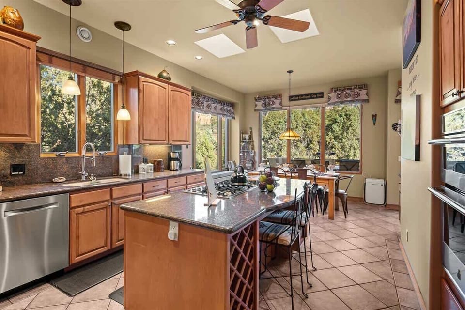The kitchen is fabulously appointed with modern appliances and amenities