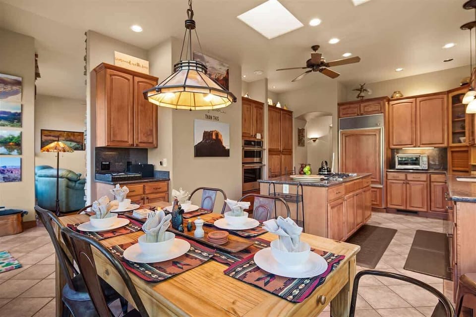 Entertaining is easy with 6 seats at the table, 2 at the counter and 6 more out on the deck