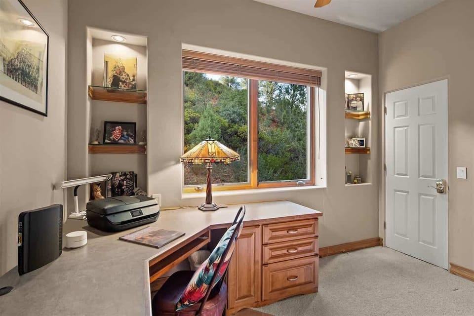 Bedroom 3 can be used as an office or a bedroom for extra guests with a queen murphy bed