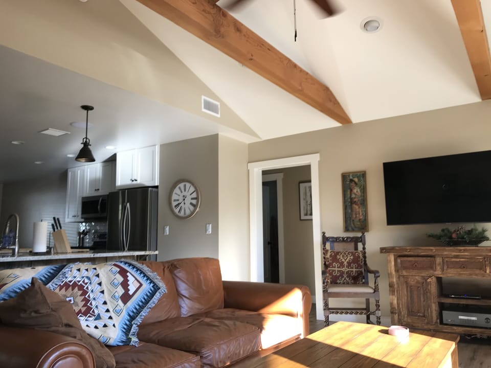 Living room with 2 adjoining Bedrooms and Full Bath. Slider door for privacy 