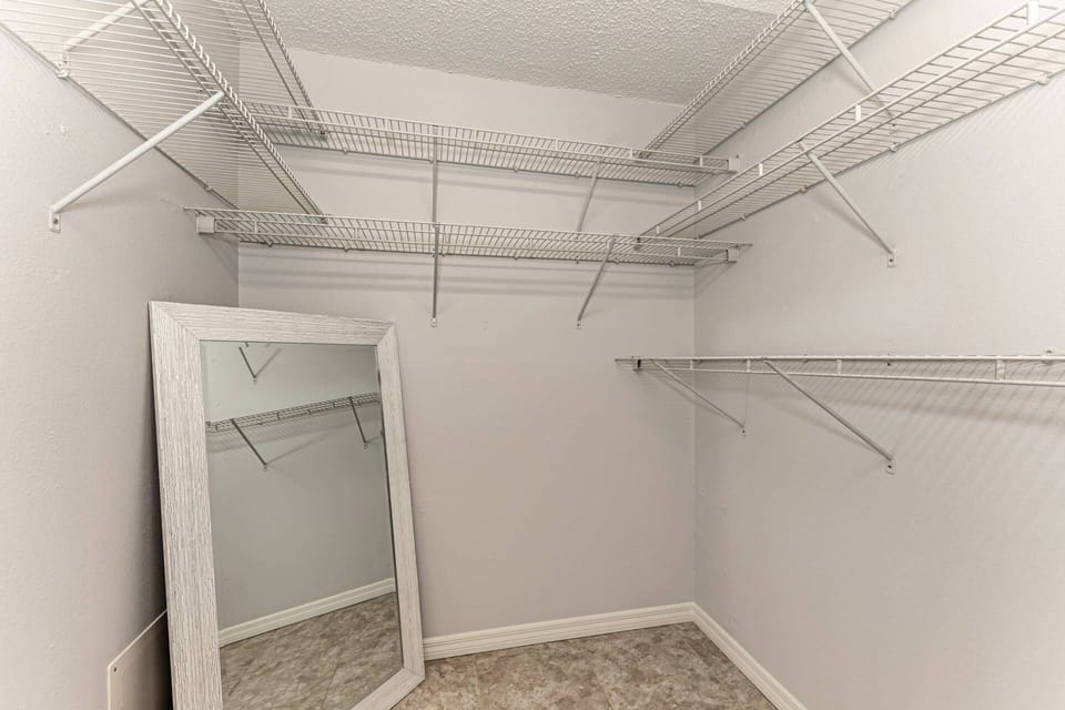 Huge walk-in closet with plenty of room to store your belongings