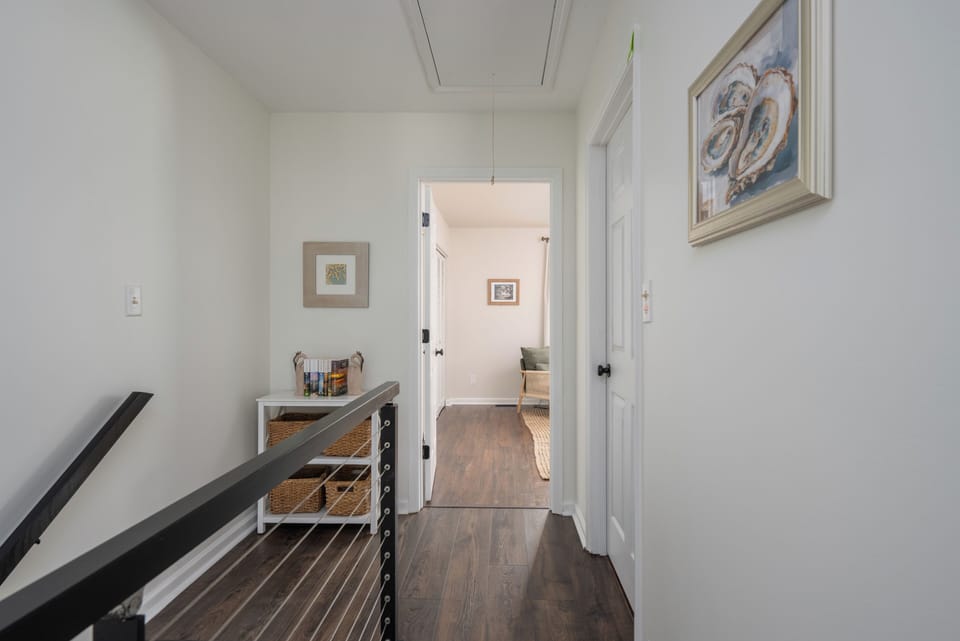 Upstairs two additional bedrooms, bathroom and laundry.