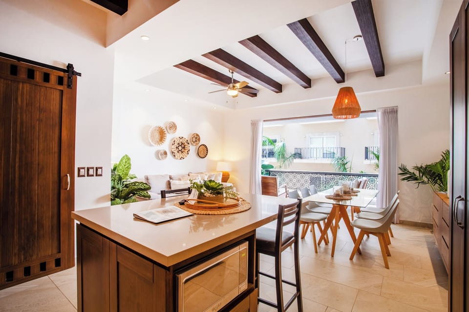 Kitchen with modern appliances and wine fridge