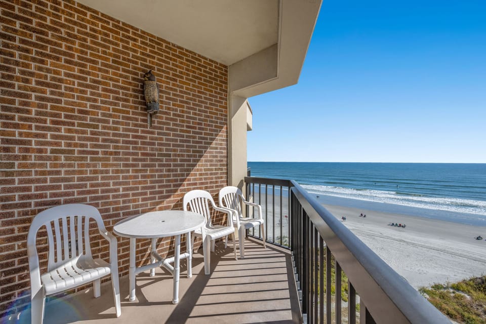 Grab a cup of joe and watch the waves coming in.