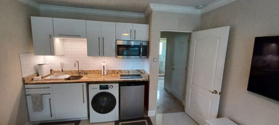 Kitchen: Microwave,  cook top , mini frig/freezer, washer/dryer, coffee maker.