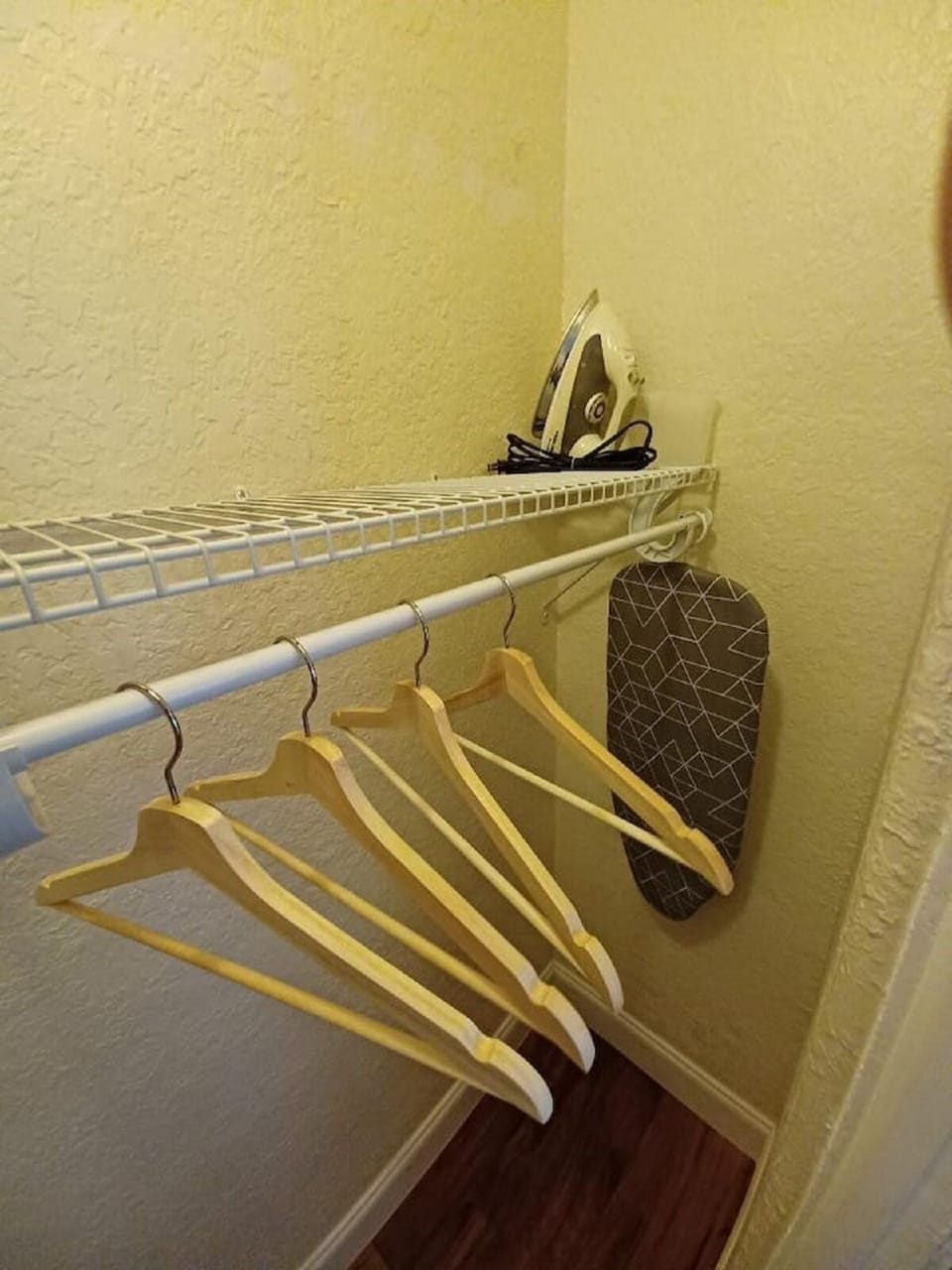 Large Bedroom closet w/iron & ironing board (just like the big guys)