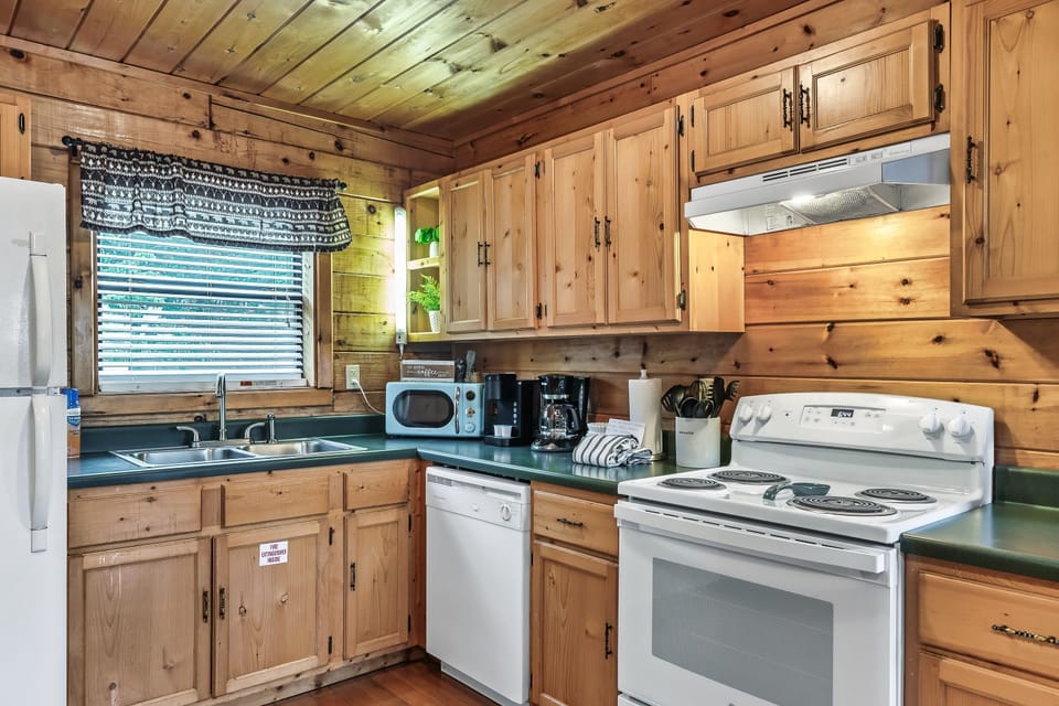 The kitchen was recently updated with stainless steel appliances