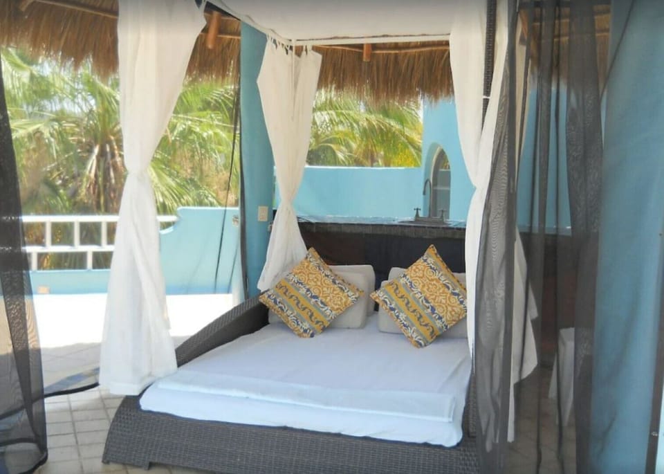 The daybed under the palapa on the 3rd floor deck.