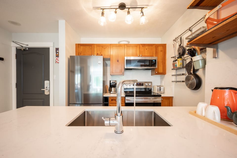 Kitchen - Brand new modern appliances make your stay as easy and comfortable as your own home.