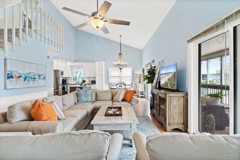 spacious and open living and dining area with access to front porch!