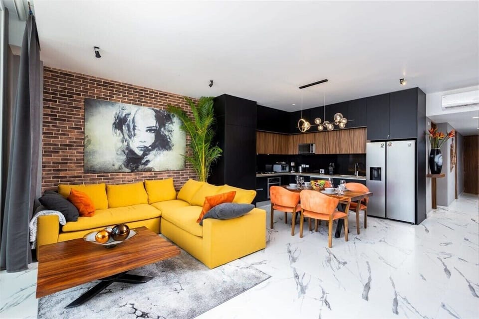 Living Area, Dining Space and Kitchen.