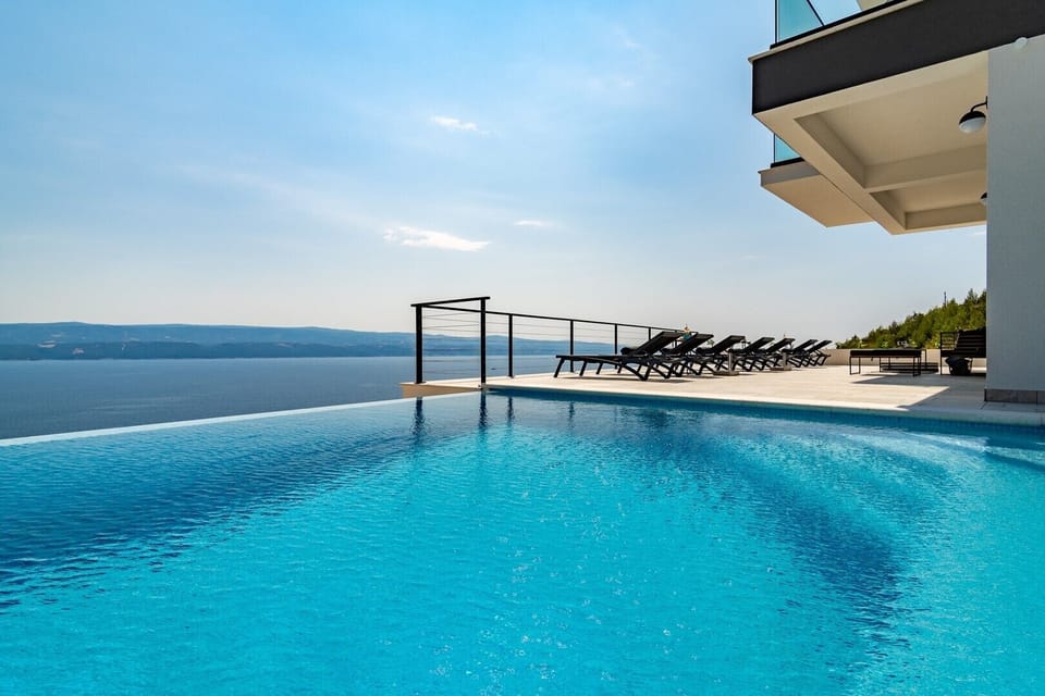 Seaview Villa Marila with 22,5 sqm private heated pool with hydromassage, 3 en-suite bedrooms (6+2 people), 1km from beach