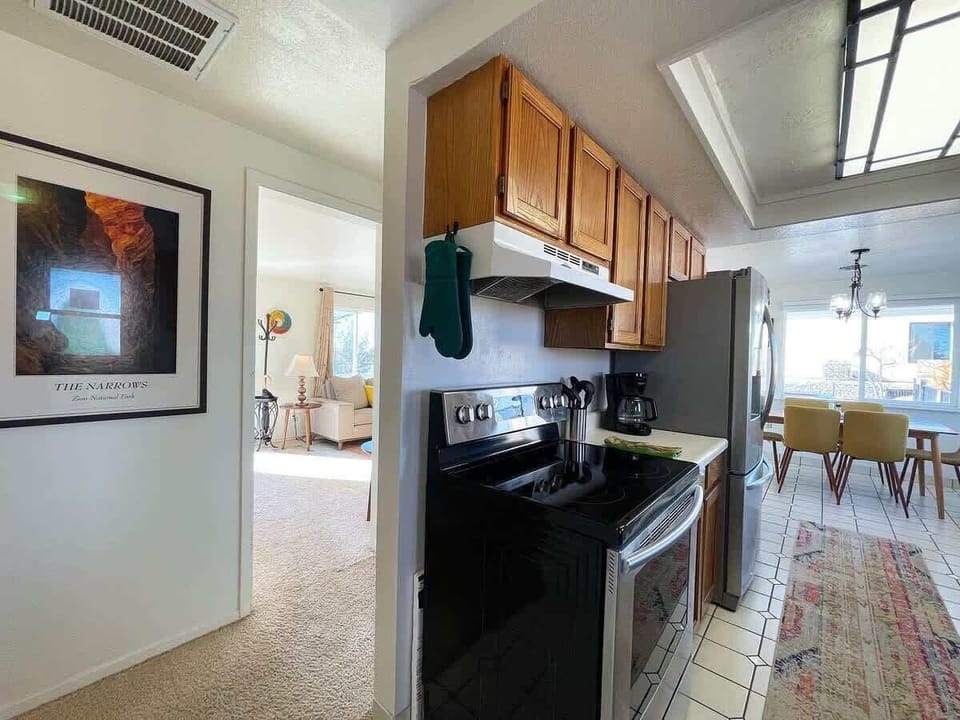 "Well stocked kitchen & home with extra linens, blankets, even a games closet and books. Nice yard and large washing machine and dryer. Great price for a very charming place to stay in an amazing area. Would definitely return!"