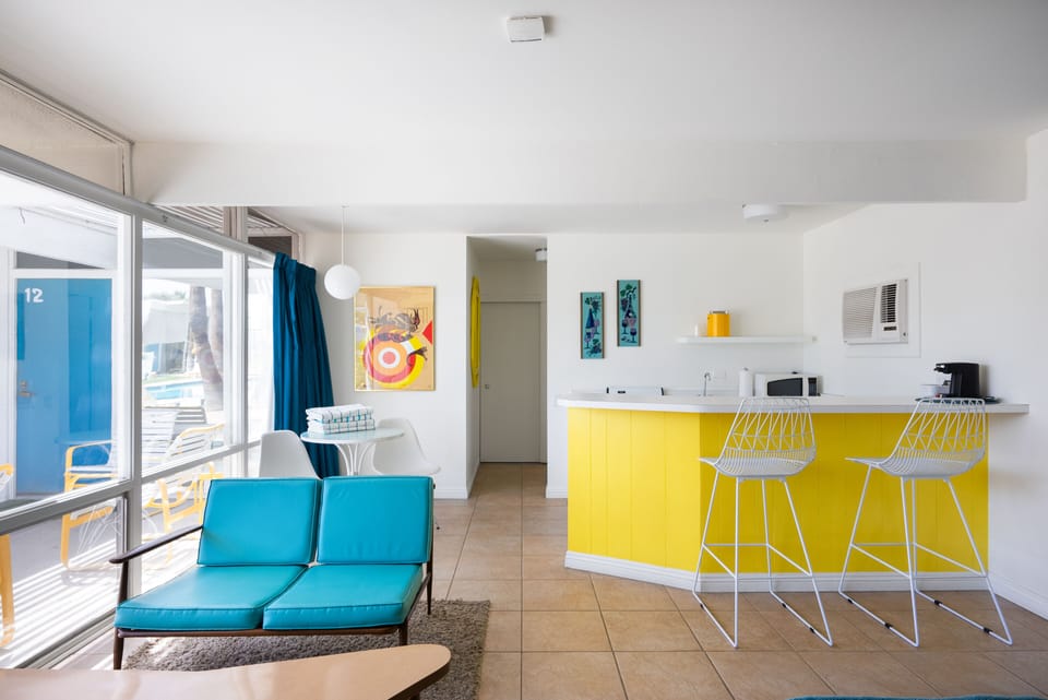 Kick your feet up in this full apartment style suite.
