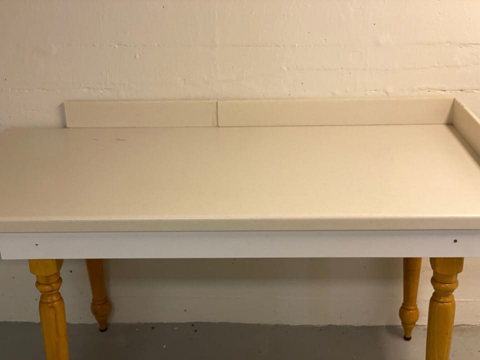 Laundry room folding table for convenience and organization
