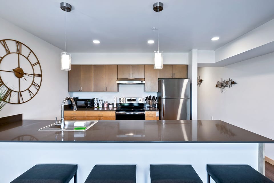 Ample space to prep, cook, and eat in this fully-stocked/spacious kitchen.
