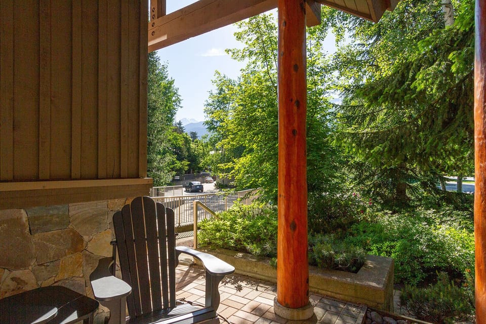 private patio with Adirondack chairs