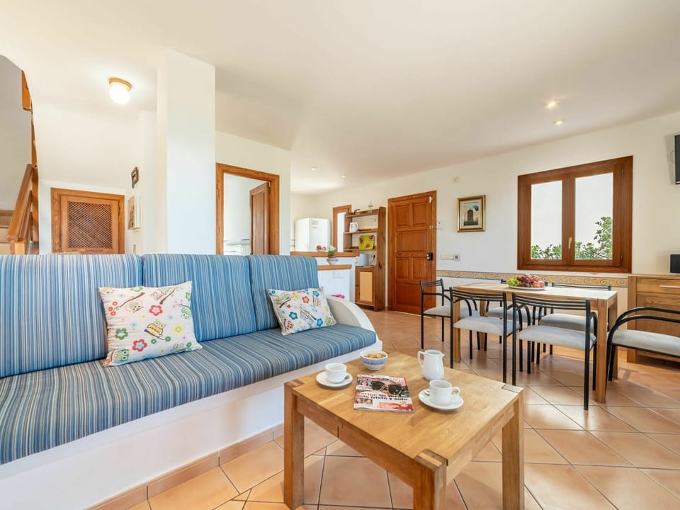 Table, Furniture, Couch, Azure, Wood, Picture Frame, Flooring, Building, Floor, Living Room