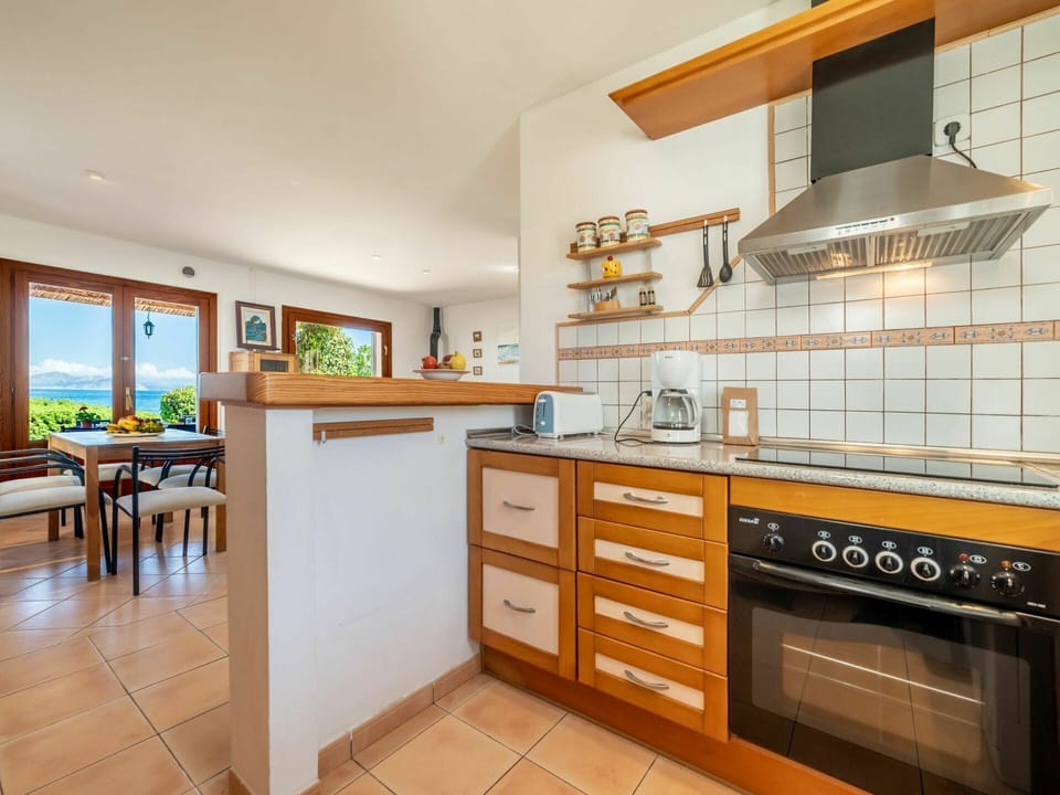 Cabinetry, Building, Countertop, Furniture, Property, Kitchen Stove, Wood, Kitchen, Kitchen Appliance, Interior Design