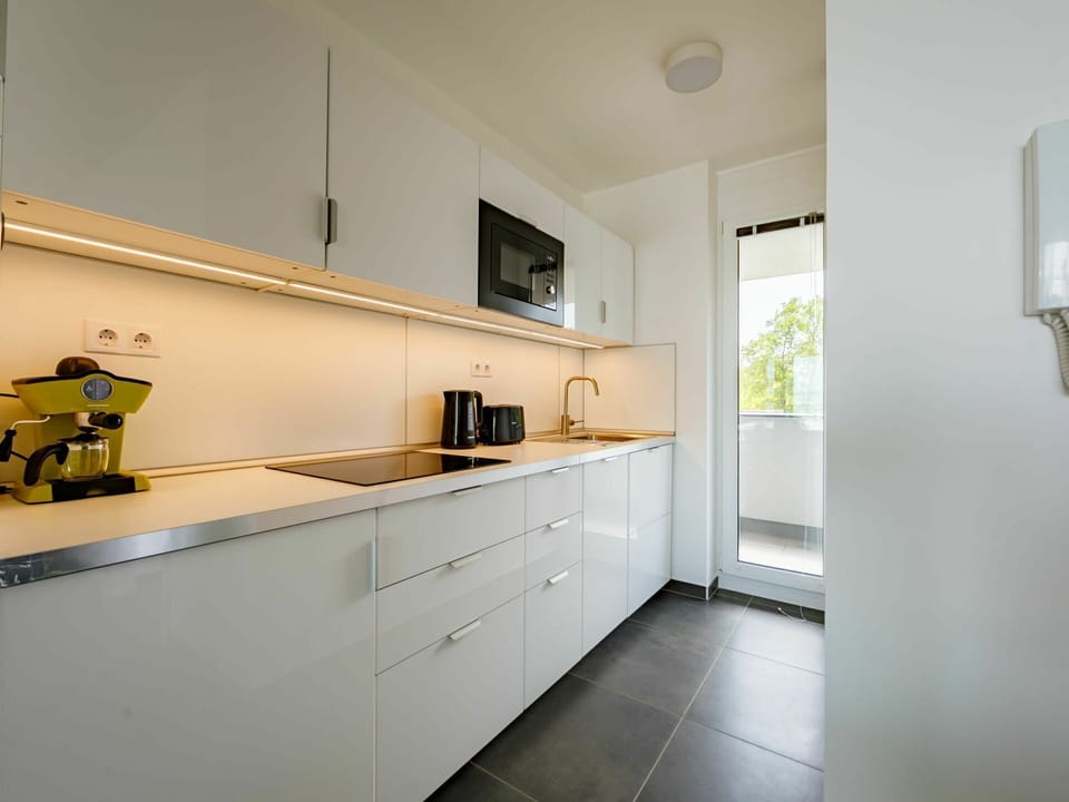 Cabinetry, Countertop, Building, Interior Design, Wood, Kitchen, Kitchen Stove, Floor, Flooring