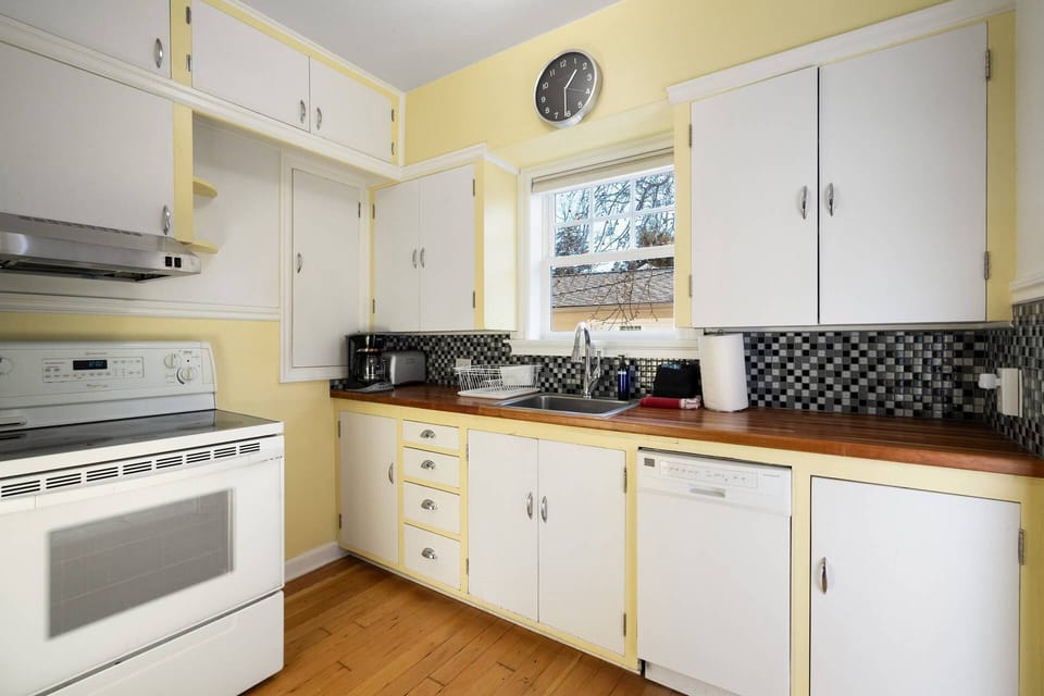 Cook a delicious meal in this charming kitchen.