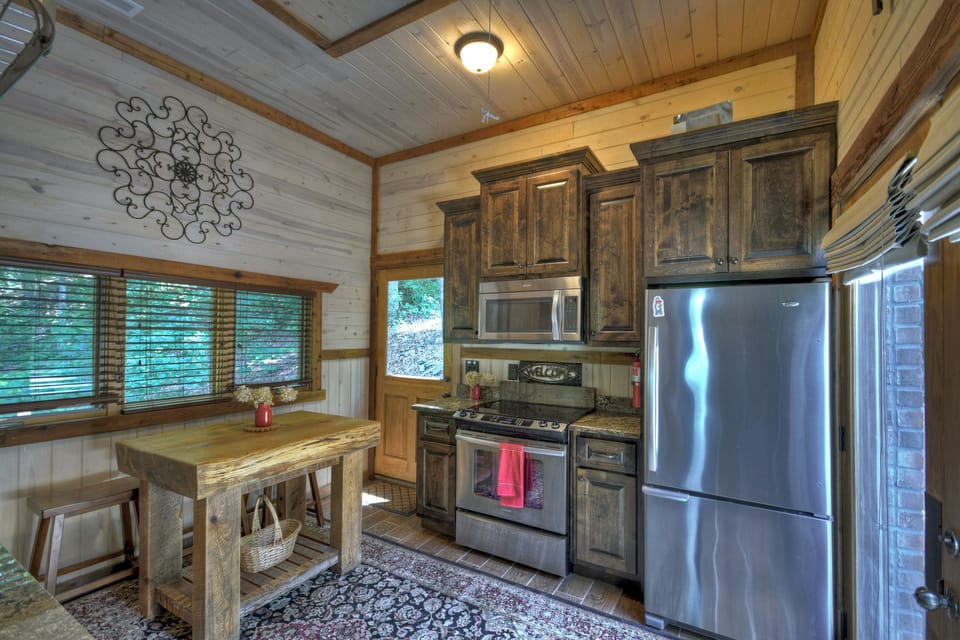 Full kitchen with butcher table.
