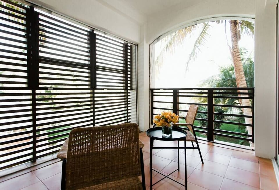 Terrace with View to the Pool with Mosquito Netting