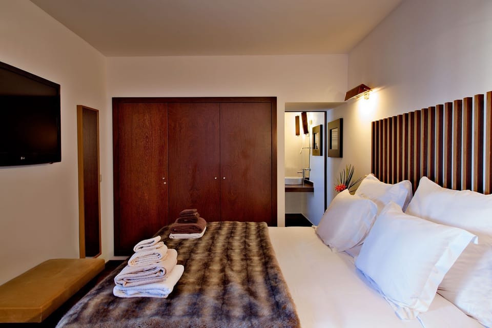 Relax on the comfy bed after a day outside.