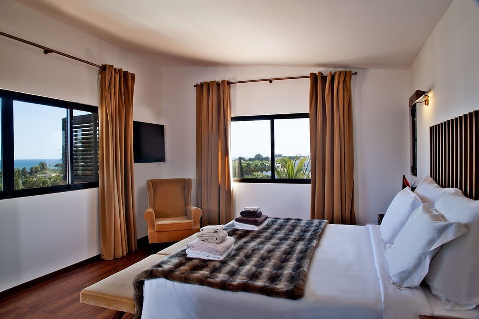 Relax on the comfy bed after a day outside.
