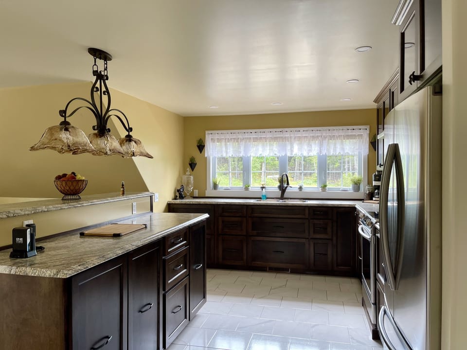 Roomy kitchen to prepare your meals.   Just bring food the rest is provided 