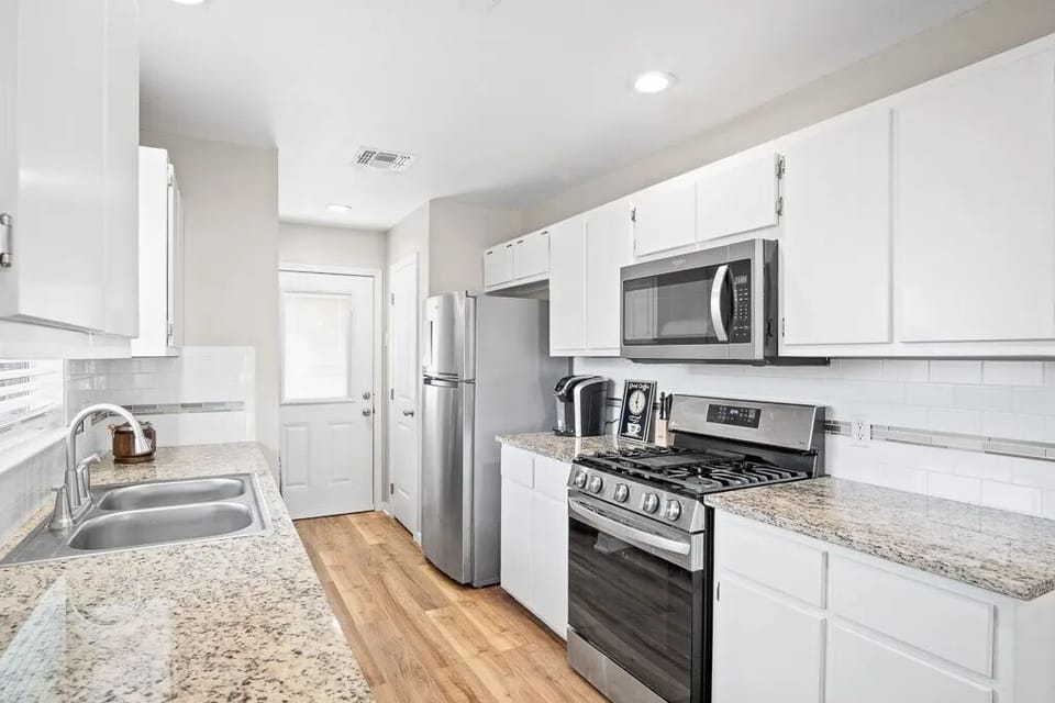 Full Kitchen with amenities including cookware, coffee maker, etc.