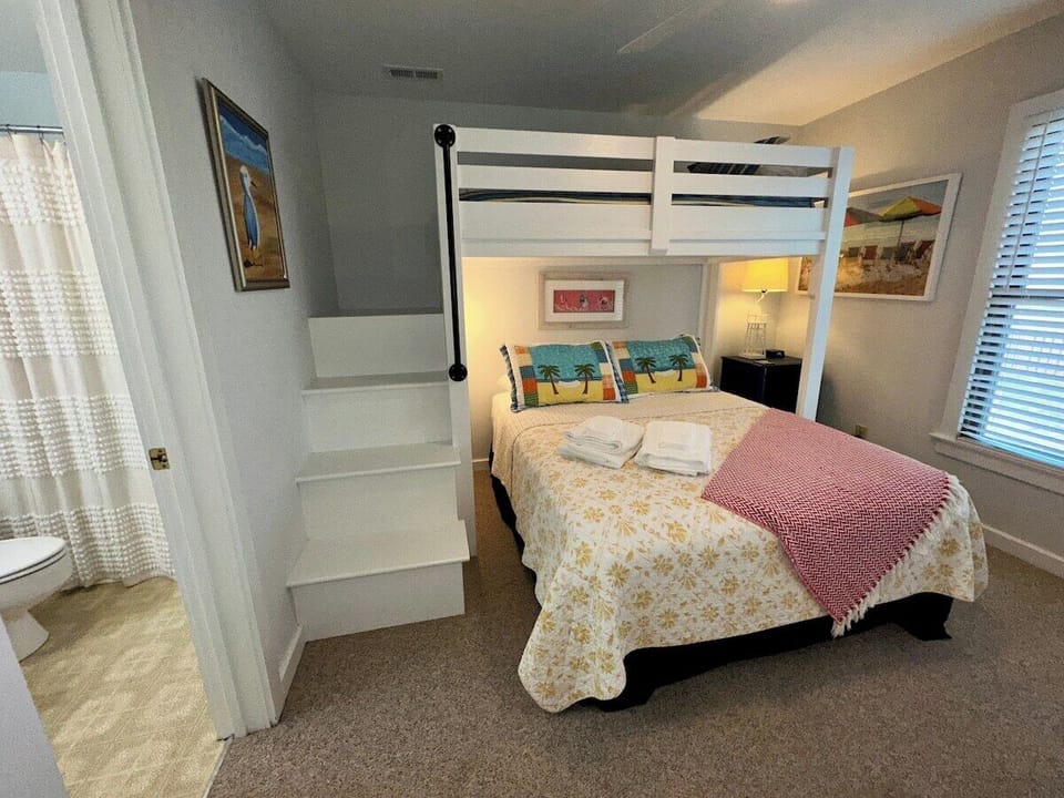 Second bedroom with Queen bed and single overhead bunk bed.