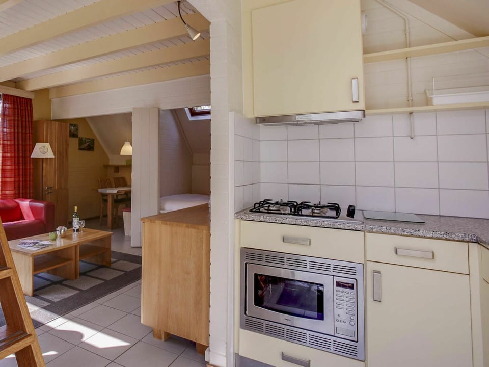 Cabinetry, Furniture, Property, Countertop, Building, Kitchen Appliance, Kitchen Stove, Kitchen, Home Appliance, Cooktop