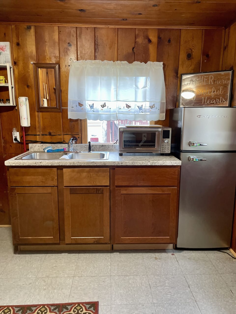 Coffee, cream, sugar, coffee pot, toaster and a cool new retro style fridge!