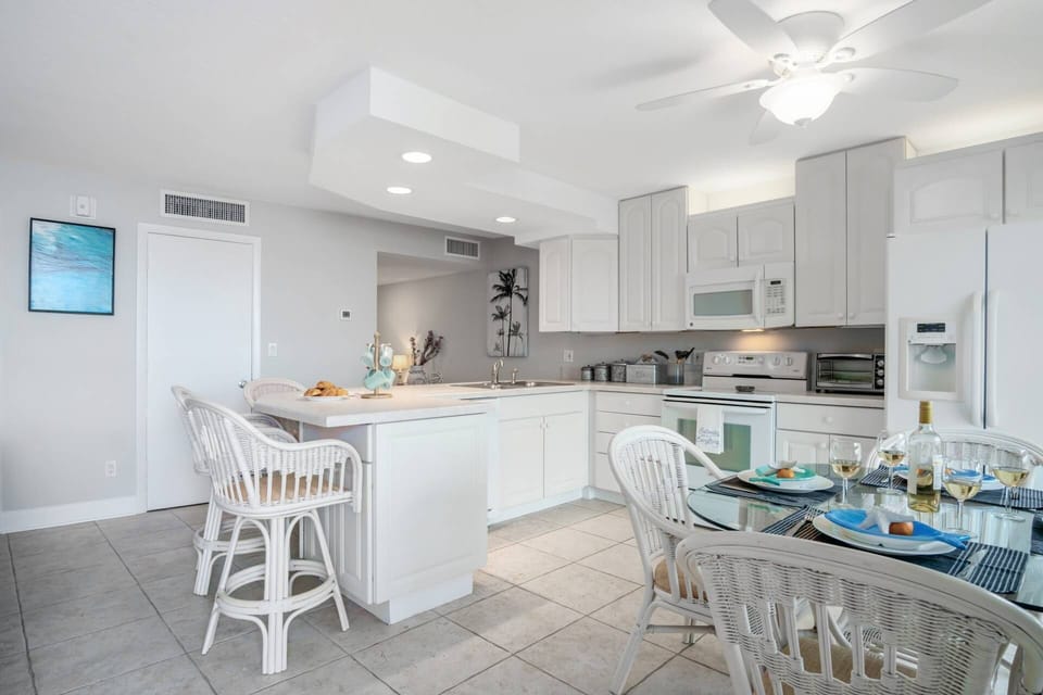 The kitchen is fully equipped to meet any cooking or cocktailing endeavors.