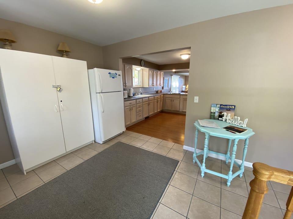 Entryway at the main level. Walk into the main level kitchen or downstairs.