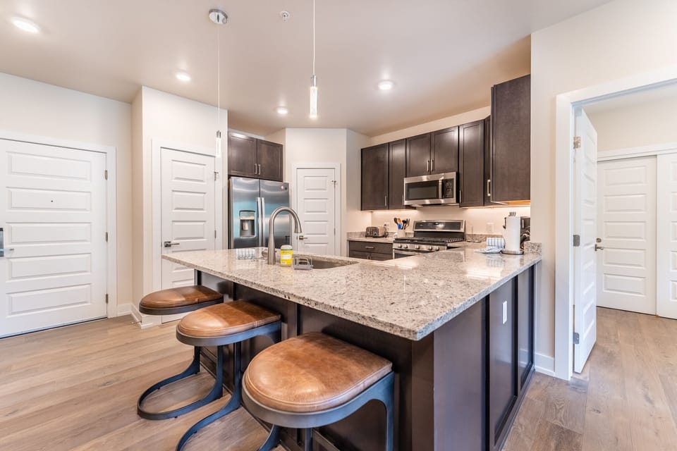 Breakfast bar with seating for three.