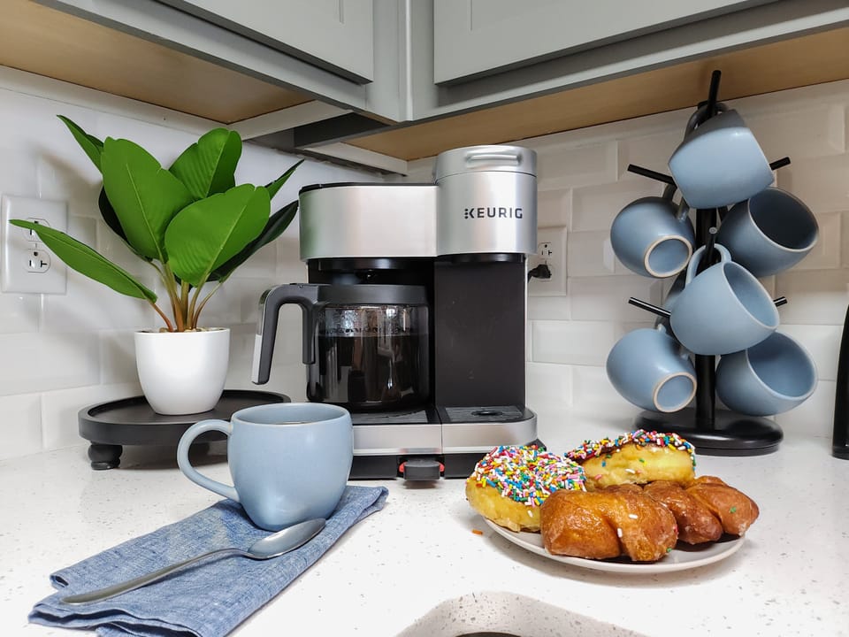 The Keurig has both a pod and drip coffee feature.