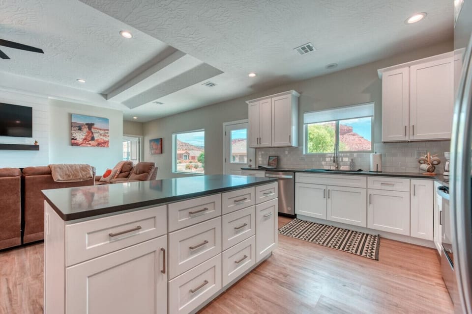 Kitchen is stocked with dishes, cookware, utensils, dish towels, kids` dishes, cups, mugs, etc. We also have 2 coolers available for guests to use during their stay.